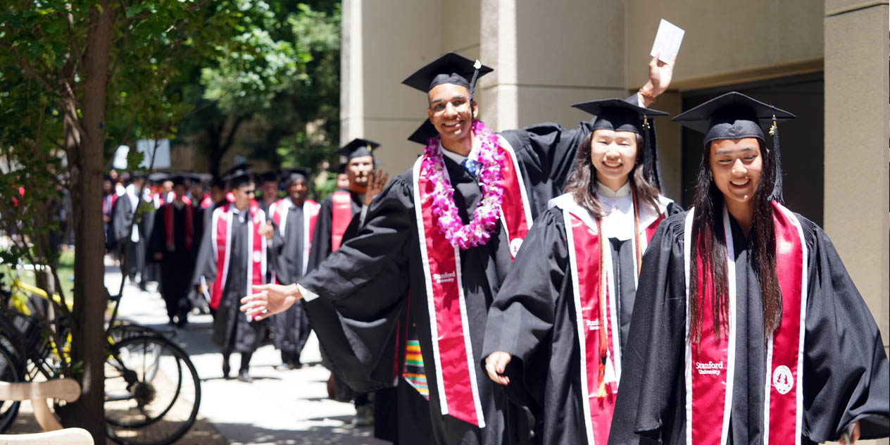 BS graduates walking