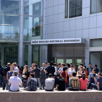 students outside of the Packard Building