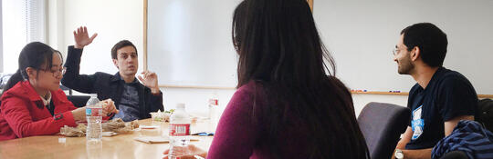 prof Eric Pop having lunch with students